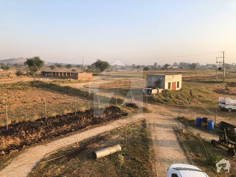 سوہاوہ جہلم میں 2 کنال زرعی زمین 14 لاکھ میں برائے فروخت۔