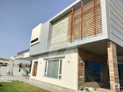 1000 Sq Yd Branded Architectural Design Bungalow With Basement & Pool Unique House For Standard Living Ideal For Tastefull Buyers Outclass. . Sale