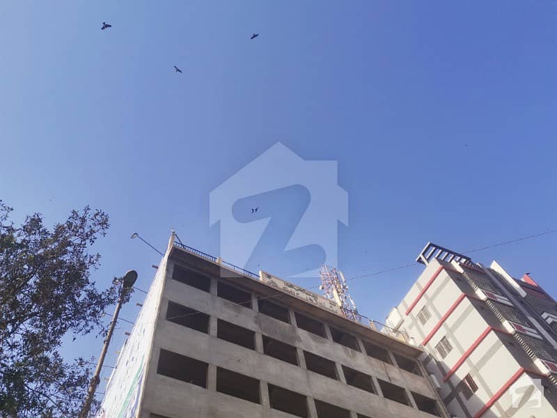 Ground plus Six Commercial Building Available for Rent on main University road Block 12 Gulshan e Iqbal Karachi Ideal for Offices Company Head Offices Schools Universities Colleges Banks Brands Chains Outlets Franchise Etc