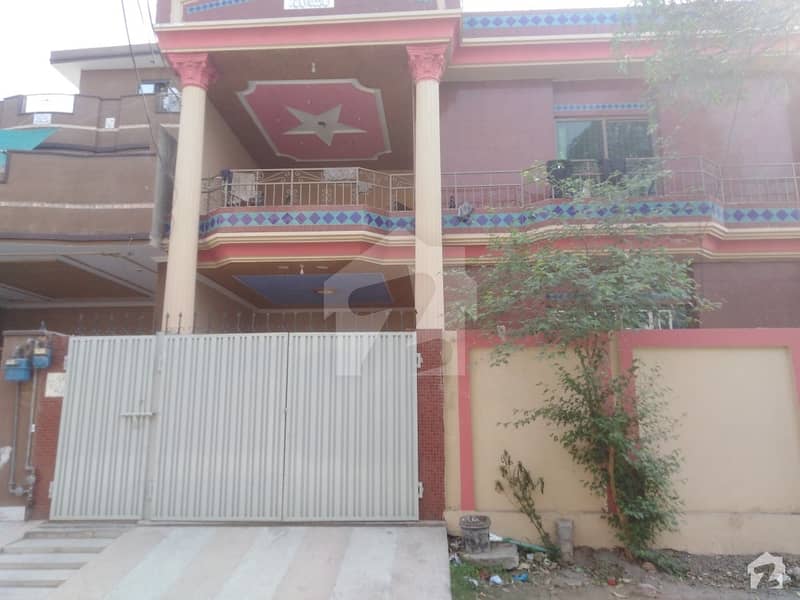 10 Marla House In Stunning Marghzar Officers Colony Is Available For Sale