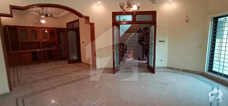 10 Marla Large House For Rent In Dha Phase 4 - Prime Location Near Main Road And All Amenities