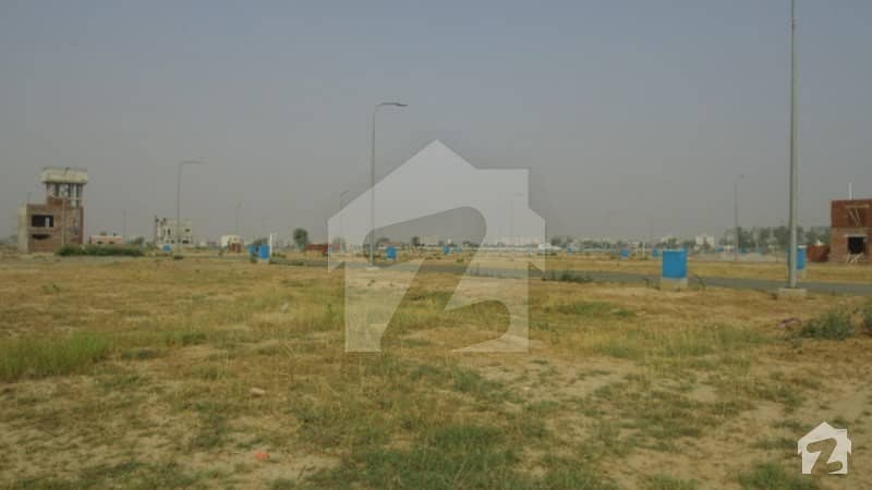 In DHA Defence Commercial Plot Sized 4 Marla For Sale