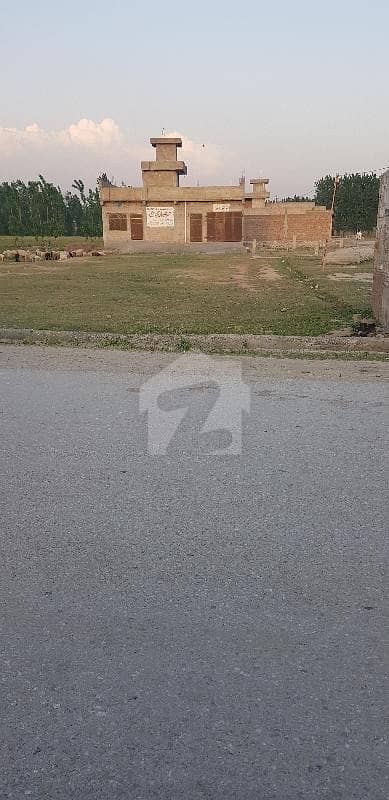 24 Marla Commercial Plot Available On Taus Road,which Is 800 Meter Away From Sawabi Road. And This Roads Also Connects With Mardan Ring Road.