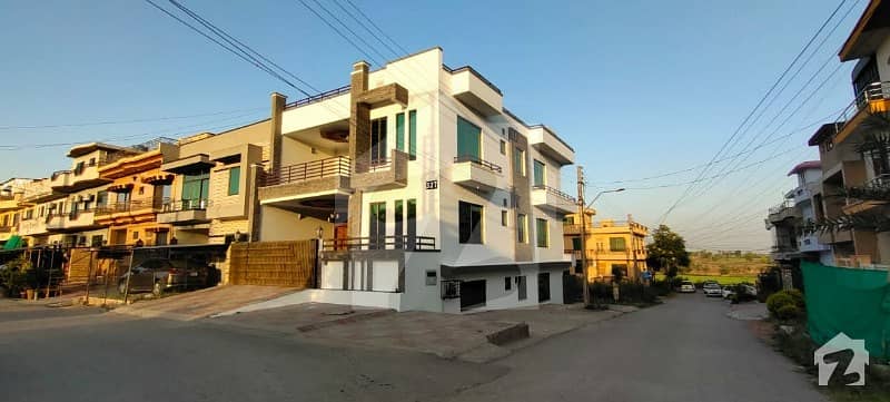 7 Marla corner house 3 Story house for sale in Margallatown phase2  Good location demand (43,000,000)char caror teis lakh