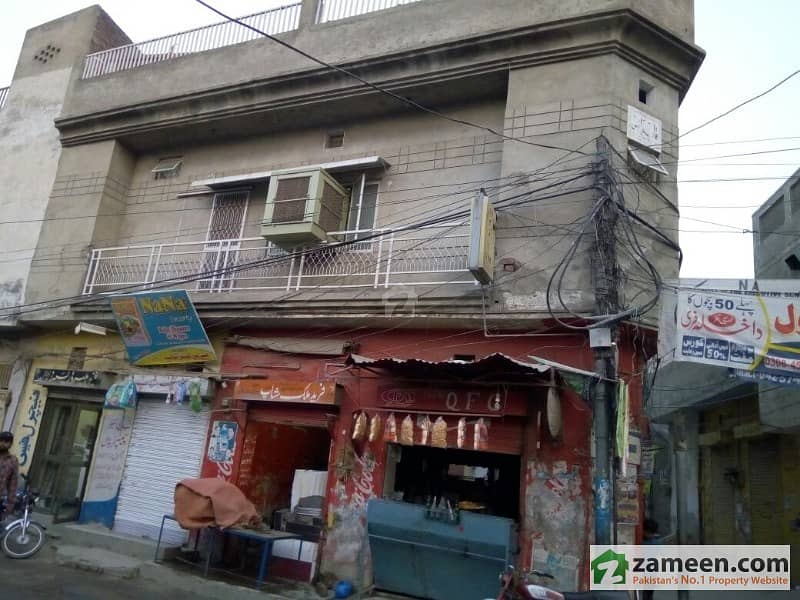 Commercial Double Storey House With 8 Shops