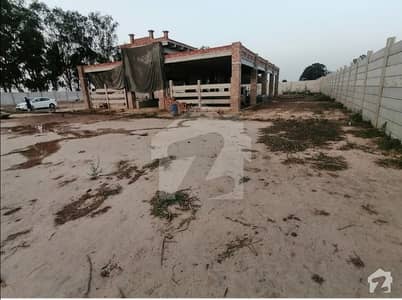 Ideally Located Farm House Of 18000 Square Feet Is Available For Sale In Lahore
