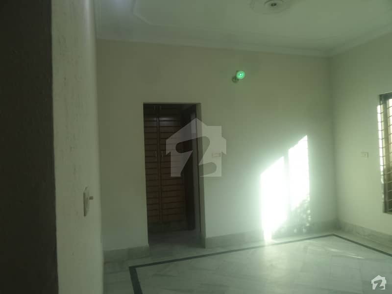 A Spacious 18 Marla House In Sher Zaman Colony