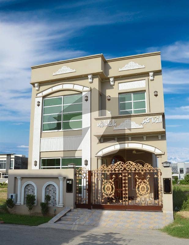 5 Marla New House Available For Sale At DHA 9 Town.