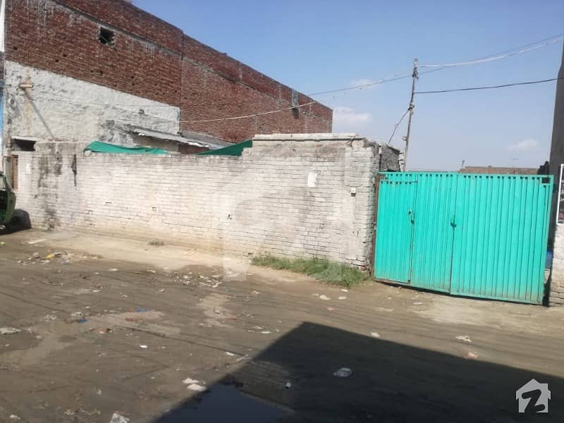 Very Amazing Plot Behind The Main Road Can Be Use For Market Or Store Nearby The Commercial Plazas Plot Covered With Boundary Wall And Gate