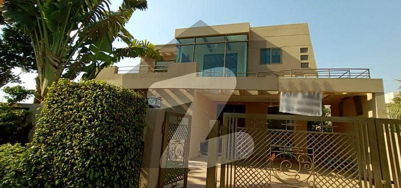 Facing Jalal Sons 1 Kanal Basement Bungalow For Sale In DHA Phase 5 Lahore