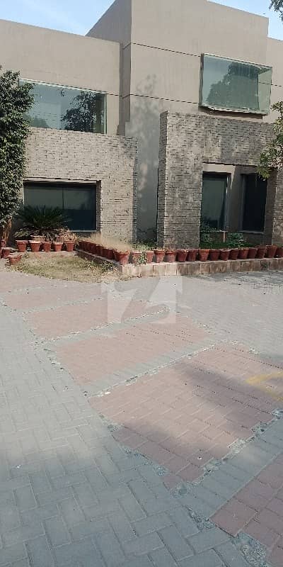 Gulberg 4 Kanal House/building Near MM Alam Road Is Available For Rent