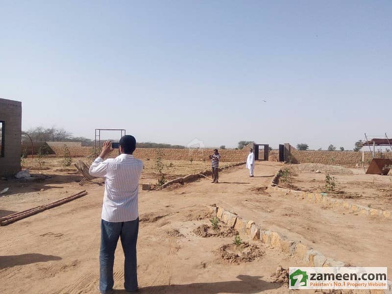 Farm Houses Plots Land on installments Near DHA City and Bahria Town Karachi