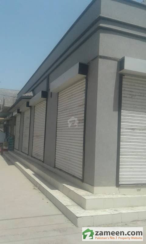 Corner House With 4 Shops Is Available For Sale In Bismillah Housing Scheme Aamir Town