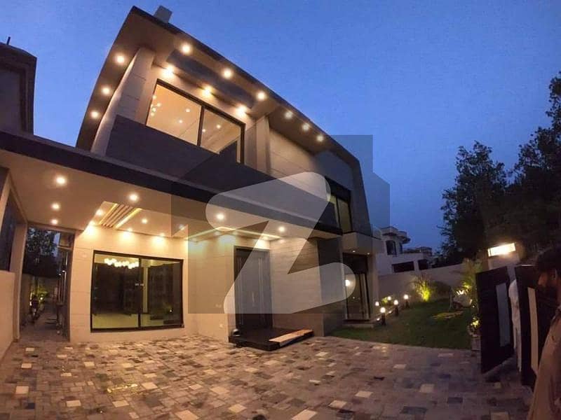 1 Kanal Most Fabulous Architectural Design Facing Park Full Basement having Home Theater, Solid Construction In phase 5 Near Sports Complex DHA Lahore Cantt