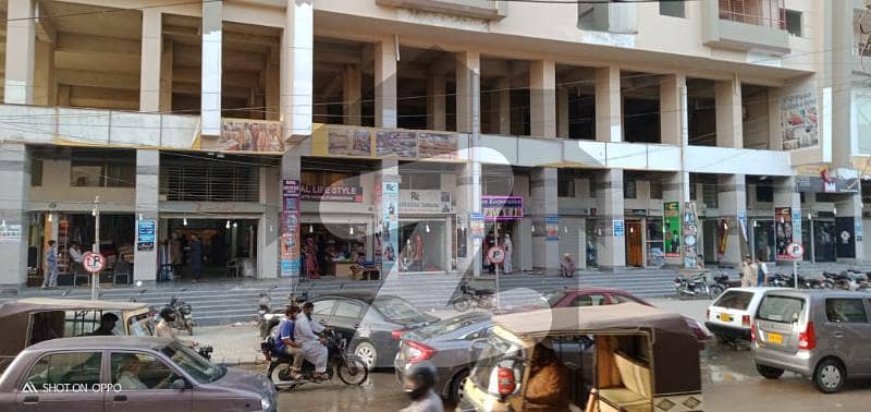 Gulshan-e-iqbal Town Shop For Sale Sized 900 Square Feet