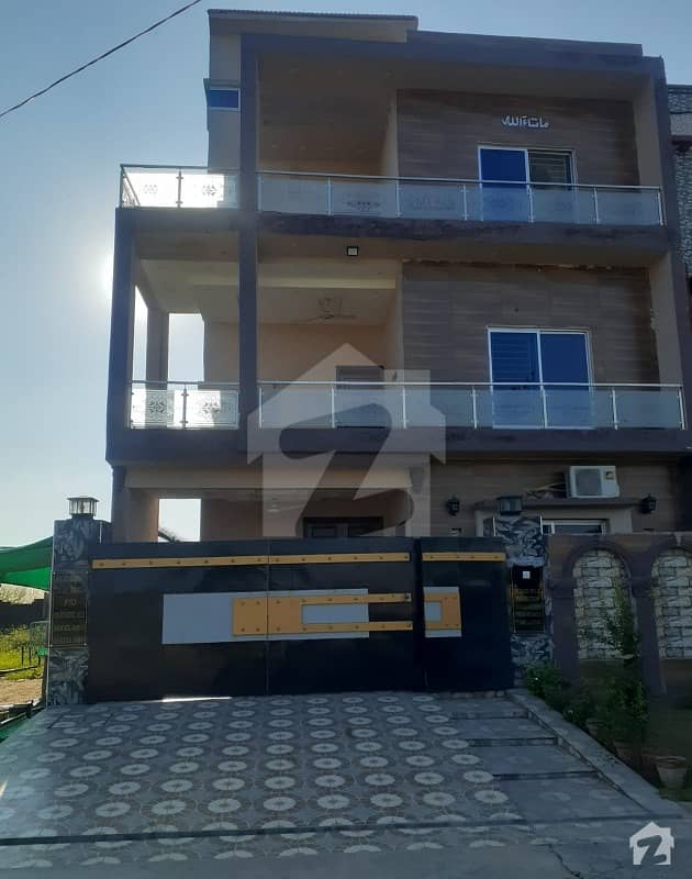 Like New 10 Marla Triple Storey Solid House For Sale