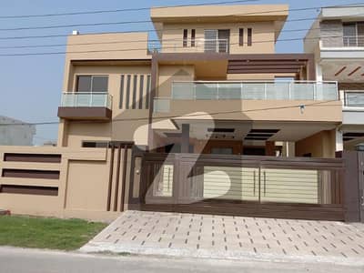 10 Marla Double Storey House Prime Location Of Wapda Town K Blok Available For Rent