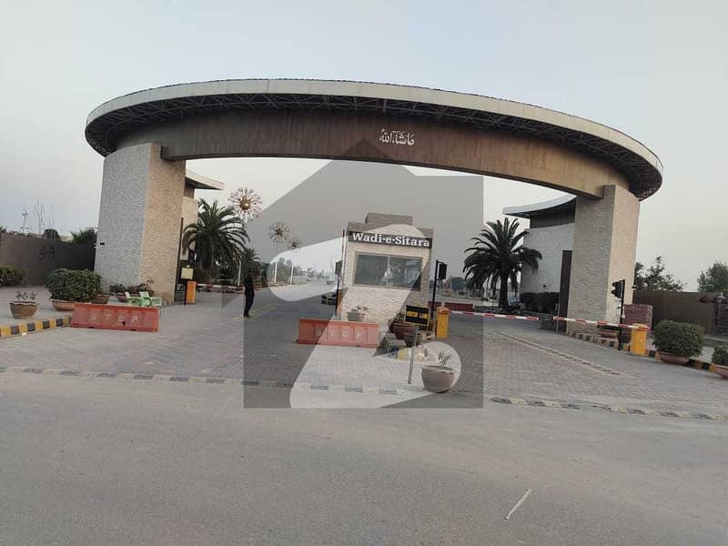 Highly-coveted Prime Location 11 Marla Residential Plot Is Available In Wadi-e-Sitara For sale