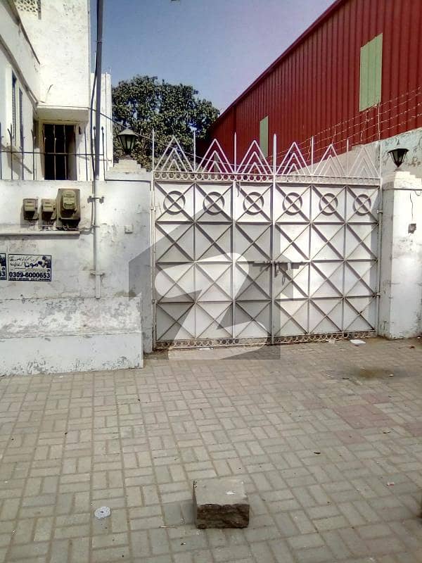 Main Khalid Bin Waleed Road P. E. C. H. S block 2 Karachi 1000 Yards Bungalow For Sale.