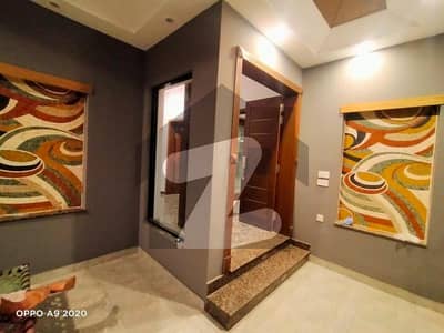 10 Marla Modern Designer Out Standing Semi Furnished And Beautiful House For Sale Location At Eden City B ,block Lahore.