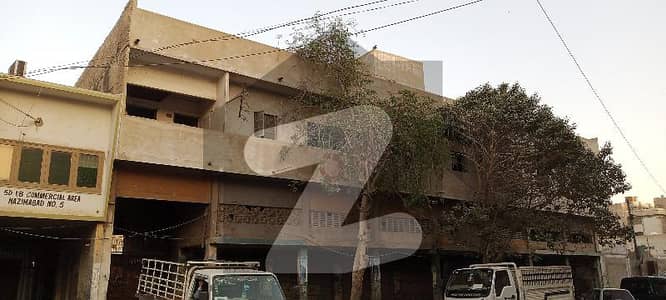 ناظم آباد کراچی میں 2.4 کنال عمارت 42 کروڑ میں برائے فروخت۔