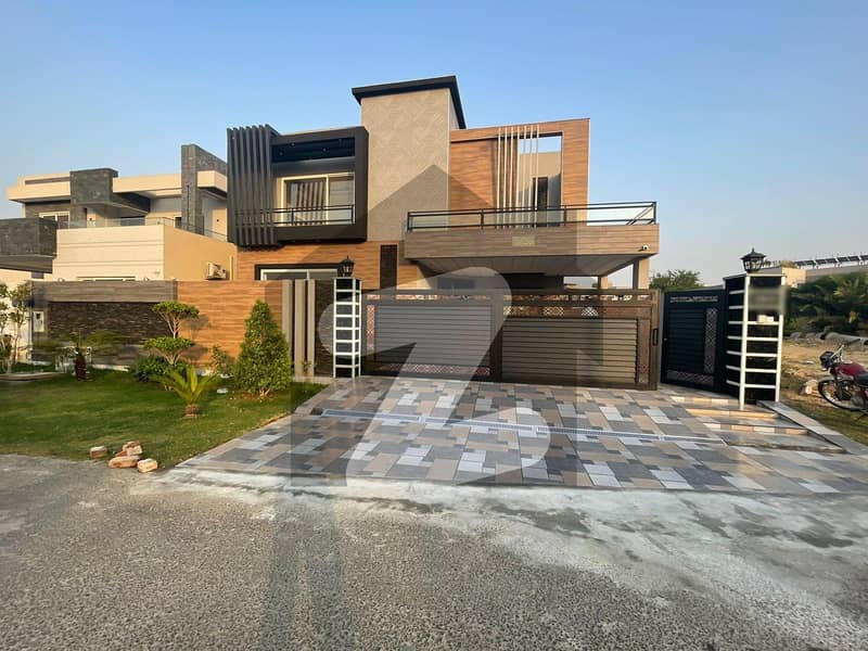A gorgeous house with full basement and multi purpose Hall and 7 bed rooms One kanal HOUSE FOR RENT. oversees clients  or people with highest aesthetic sense Should Rent This House Located Ideally In DHA Defence