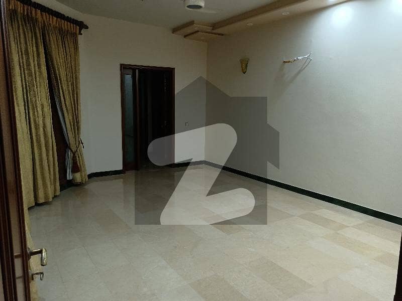 sial estate offer 2 kanal fully house unfurnished for rent phase 2 outclass location carpet road emple car parking Italian kitchen tiled and marble floring with wood floring beautiful lawn 2 side lawan carpet clean road near hospital near markit