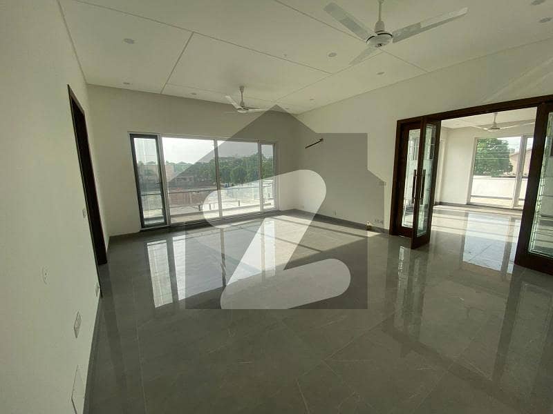D H A Lahore 2 kanal brand new owner Build full Basement design house with 100 original pics available for Rent