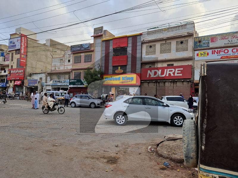 Main 200 feet road facing shop for rent in north Karachi near kababjees