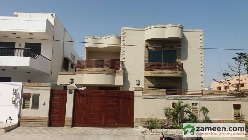 deffence phase 6 khyban bukhari 500 yards  outclass banglow for sale very peacefull location proper west open just like a brand new house 5 specious bed rooms with attached bath all imported fittings and fixtures 2 carparking