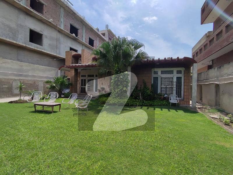 26 Marla 3 Marla Extra Land House In The Main Madina Town Area For Sale