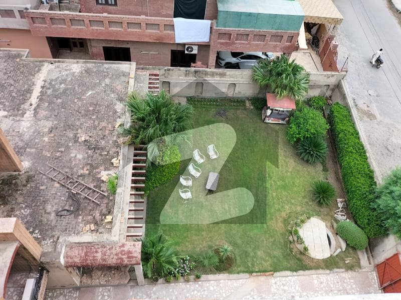 26 Marla 3 Marla Extra Land House In The Main Madina Town Area For Sale