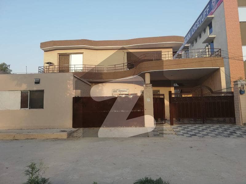 House located on prime location on main Canal Road Besides 2 Commercial banks