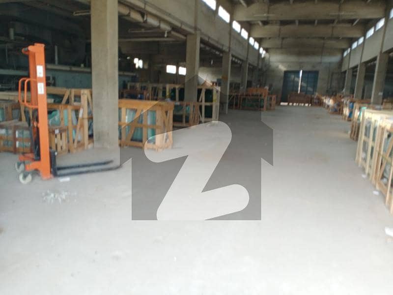Prime Location main road of Super High Huge warehouse available for rent in Scheme 33 near Jan Japan Motors