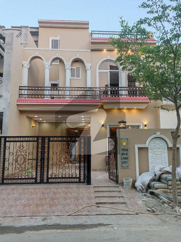 7 Marla Brand New House Facing Park For Rent In M7b Block Lake City Lahore.
