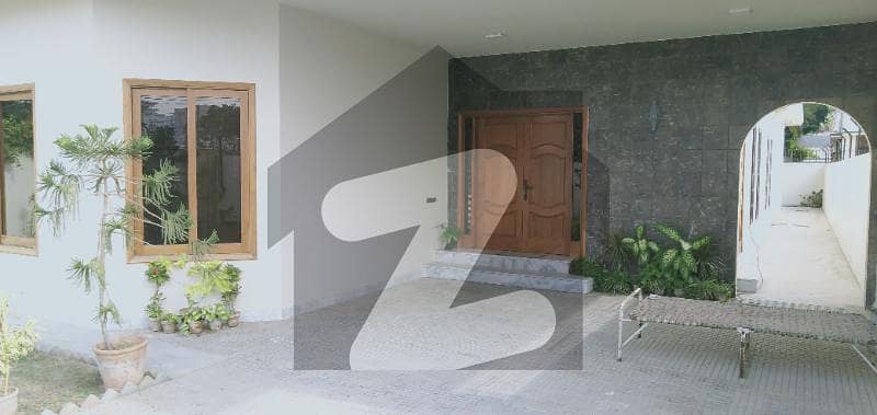 Semi Furnished Extra Ordinary Maintained 666 Square Yards Semi Furnished Five 05 Bedroom West Open Bungalow With Lush Green Lawn Located In The Most Prime Location Of Janbaz Dha Phase 5 Is Available For Rent