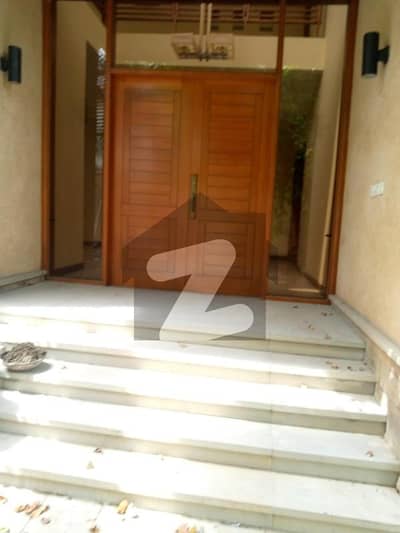 1000 Yards Almost New Bungalow Available For Rent In Phase 6, Dha Karachi.