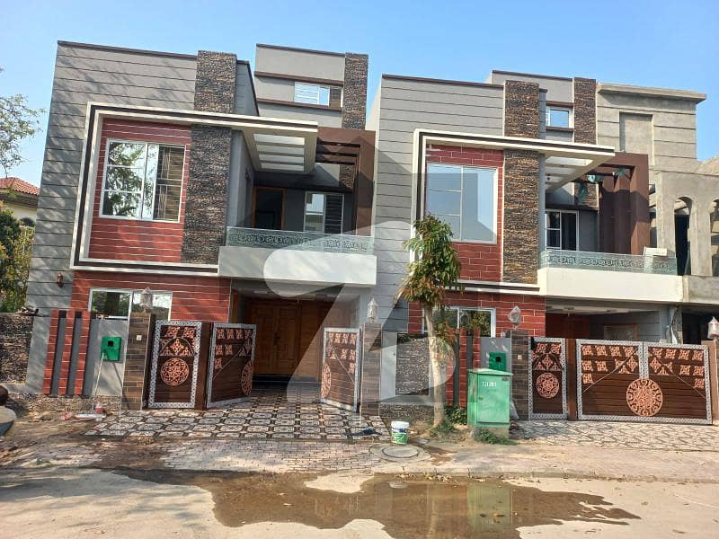 5 Marla Brand New House For Sale In Jinnah Block Sector B Bahria Town Lahore.