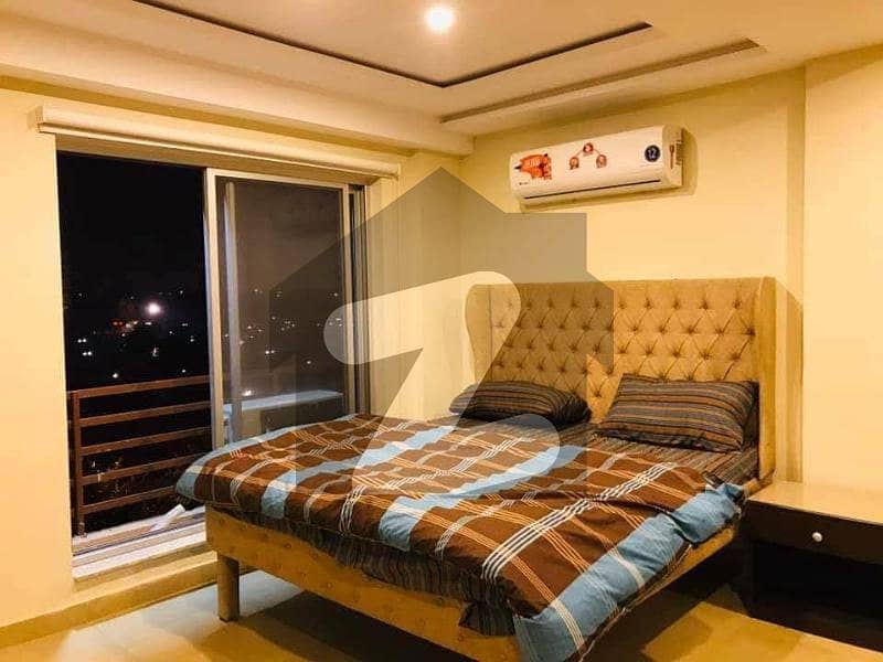 1 BEDROOM LUXURY FURNISHED FACING EIFFEL TOWER BUILDING APPARTMENT AVAILABLE FOR SALE IN BAHRIA TOWN LAHORE