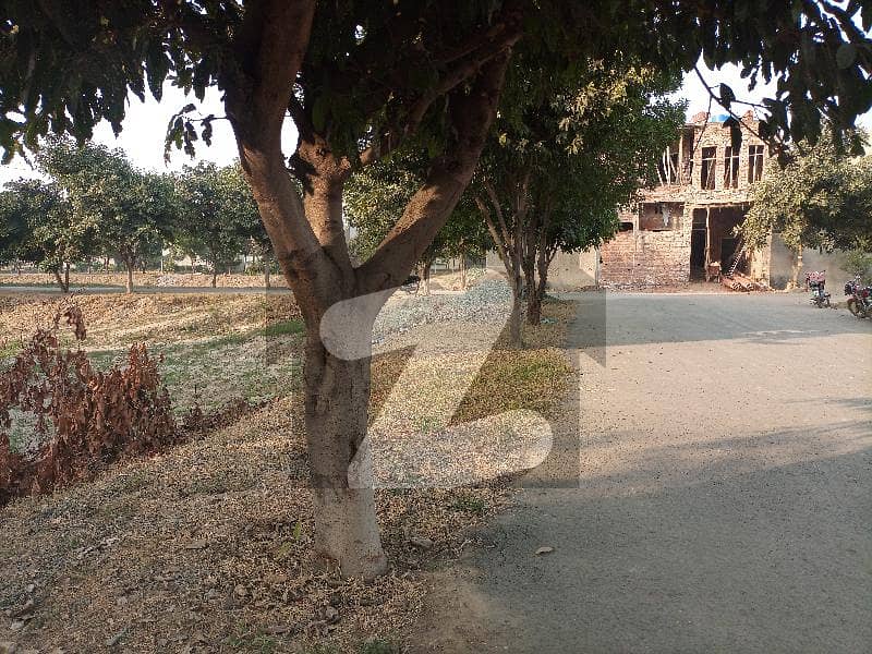 5 Marla Plot Is Available For Sale In Palm Villas Housing Society Canal Road Near Jallo Lahore.