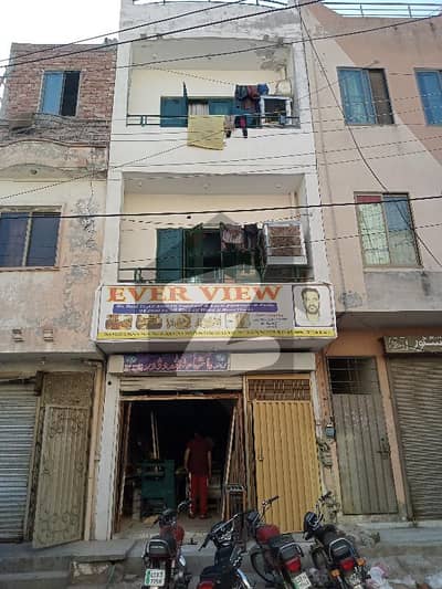 2 Marla 1 Shop + 3 Portions Family Residence 4 Story Commercial Building Address: Shop No. S-20 Al Makkah Society Near Butt Chowk College Road Lahore.