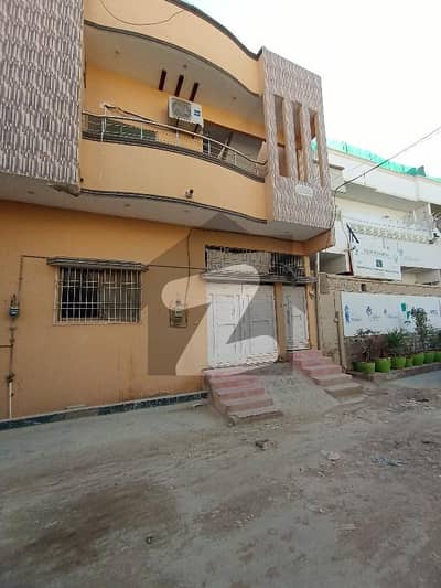 Legal estate by Hassan 100 yard house 3 years old Near Bank Al Habib 5 feet wide Road for sale .