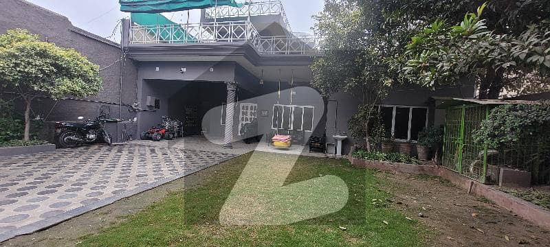 Own Built House with 8 Marla Lawn and 10 Car Parking. can be used as a commercial hostel or office because nearby properties are used as commercial