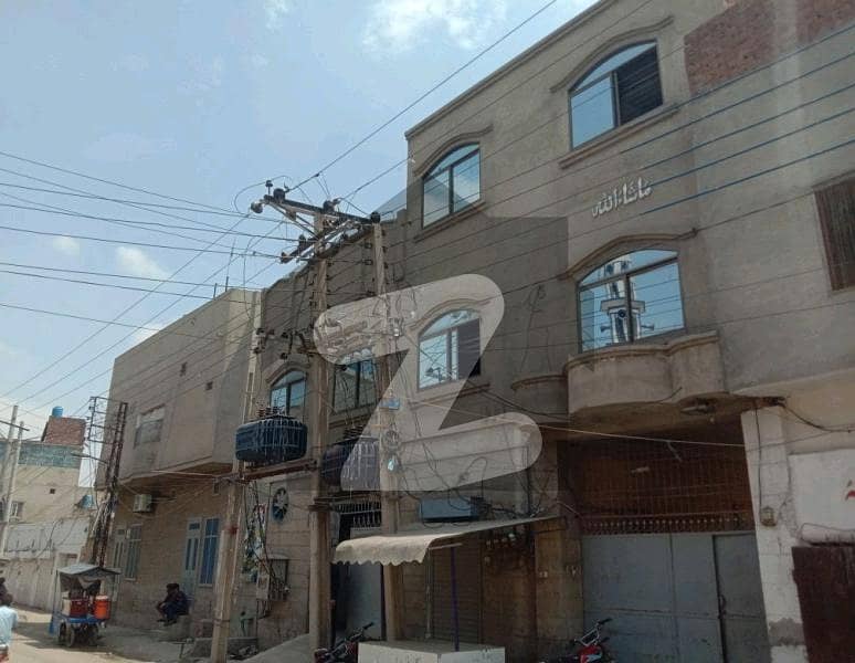 جھمرہ روڈ فیصل آباد میں 15 مرلہ عمارت 4.5 کروڑ میں برائے فروخت۔