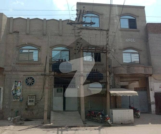جھمرہ روڈ فیصل آباد میں 15 مرلہ عمارت 4.5 کروڑ میں برائے فروخت۔