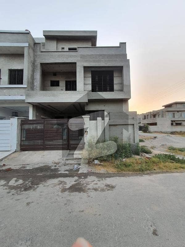 5 Marla Gray Structure Double Story House With 3 Bed 4 Bath 2 Living Rooms, 1 Drawing Room And Car Porch. Located In Canal Gardens Lahore Demand 14,000,000/-.
