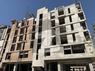 ground plus 5 project in faisal town block A apartment and shops are available 50% down payment remaining amount is an installment. . . grab this Appourtunity. . 70% project complet. . . .