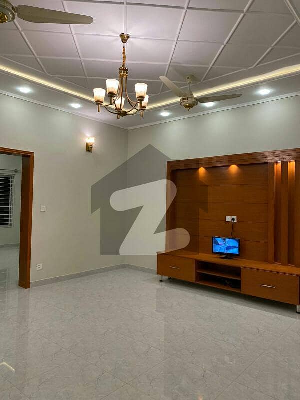 G -13 Brand New Architect Design Double Story House Size 200 Yd Prime location 5 Bedrooms Attached Stylish Bathrooms Double Drawing Dinning Powder Room Two Tv Lounge Two American Style Kitchen Sqtr Two Car Parking Reasonable Price
