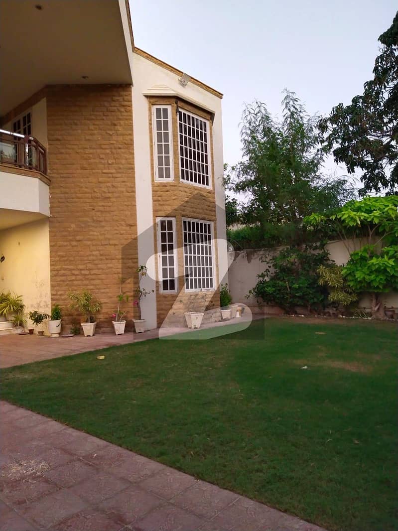 ڈی ایچ اے فیز 6 ڈی ایچ اے,کراچی میں 6 کمروں کا 1 کنال مکان 13.5 کروڑ میں برائے فروخت۔