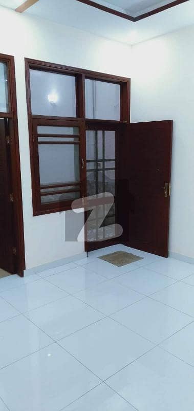 Yard Upper Portion Neat And Clean 3 Bed Rooms Lounge With Servant Room Roof fully Renovated Location Reasonable Rent Near National Stadium Aga Khan Hospital